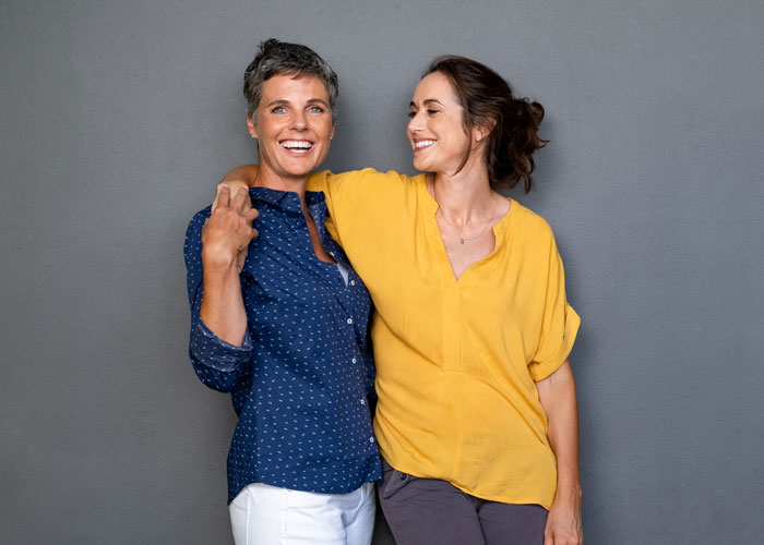 two women smiling Atlanta Oral & Facial Surgery