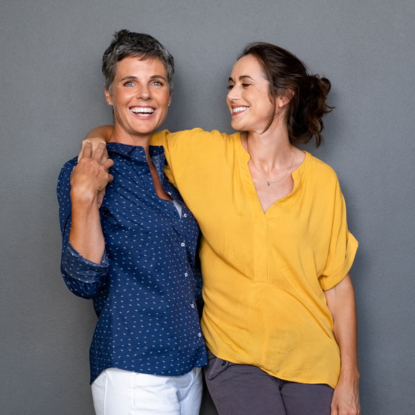 two women smiling Atlanta Oral & Facial Surgery