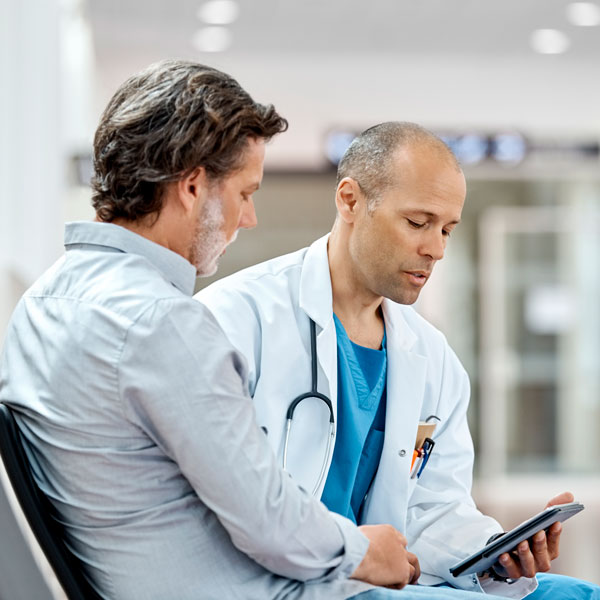 doctor with patient Atlanta Oral & Facial Surgery