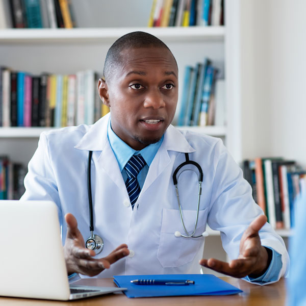 doctor with patient Atlanta Oral & Facial Surgery