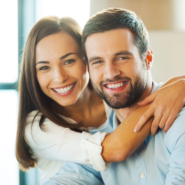 smiling young couple Atlanta Oral & Facial Surgery