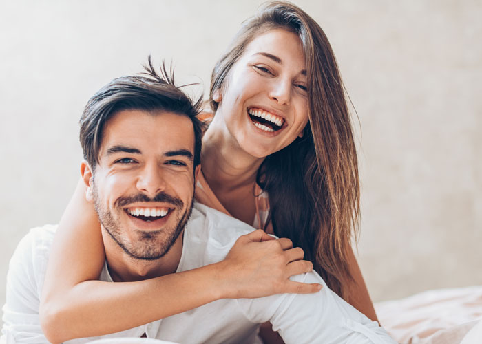 laughing young couple Atlanta Oral & Facial Surgery