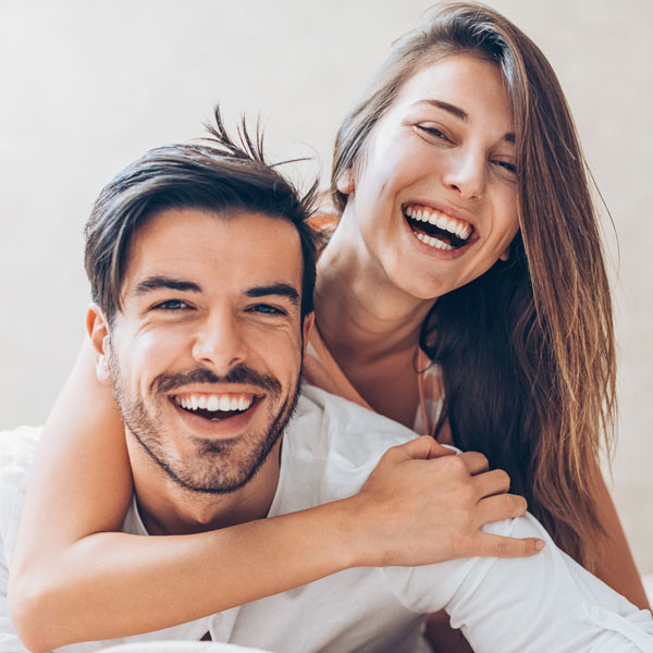 laughing young couple Atlanta Oral & Facial Surgery