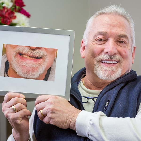 Man holding a photo